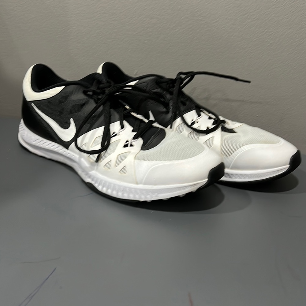 Men’s white and black Nikes size 12